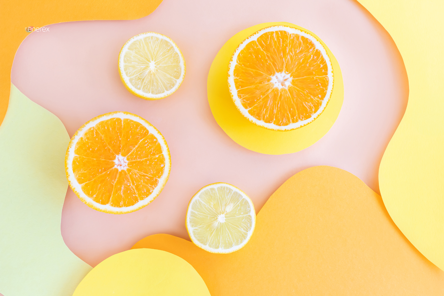 oranges and lemons with a pink and orange and yellow background